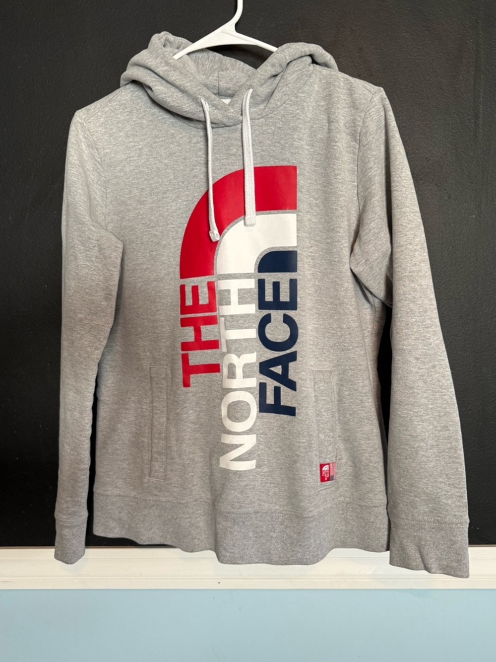 The North Face Women's Gray Hoodie with Red, White & Navy Logo